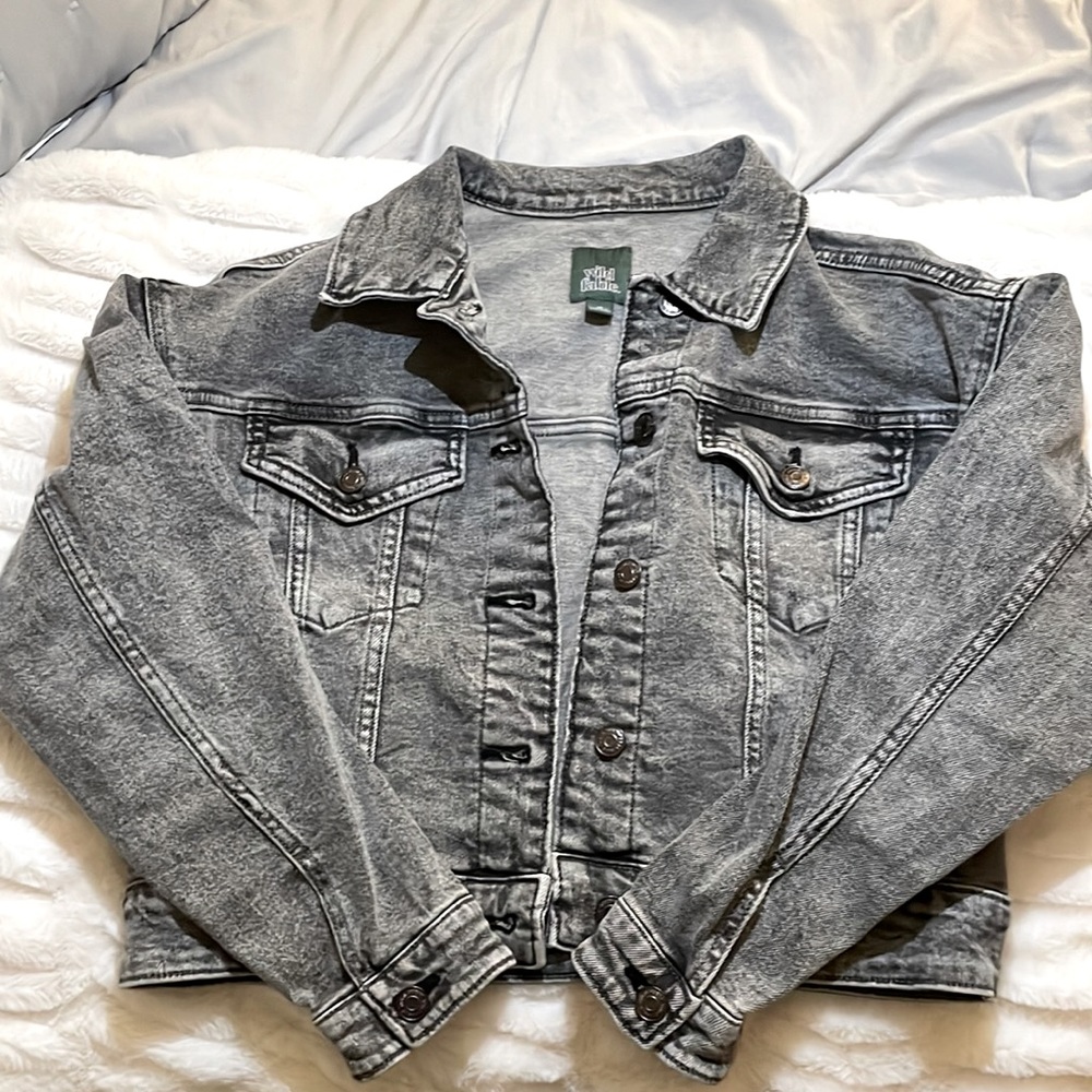 Women’s black jean jacket.